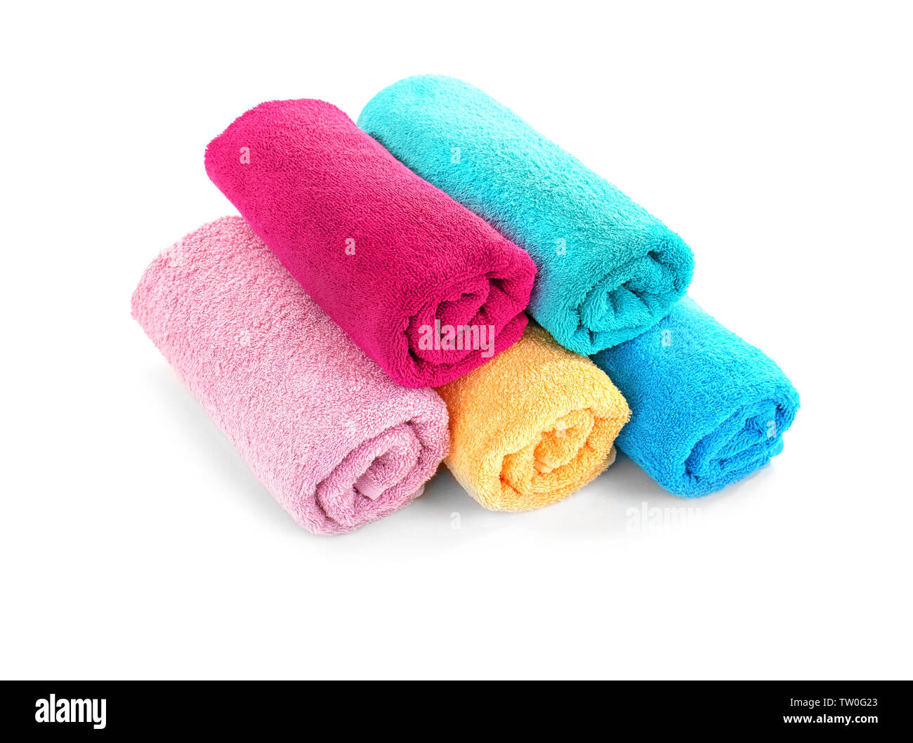Pile of rolled towels isolated on white Stock Photo