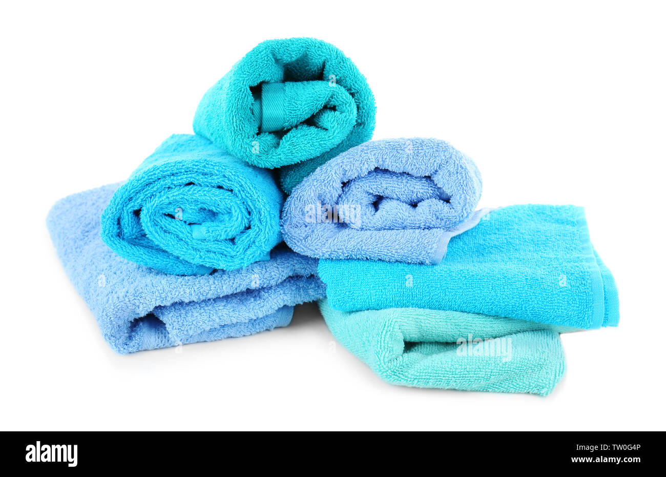 Pile of towels isolated on white Stock Photo