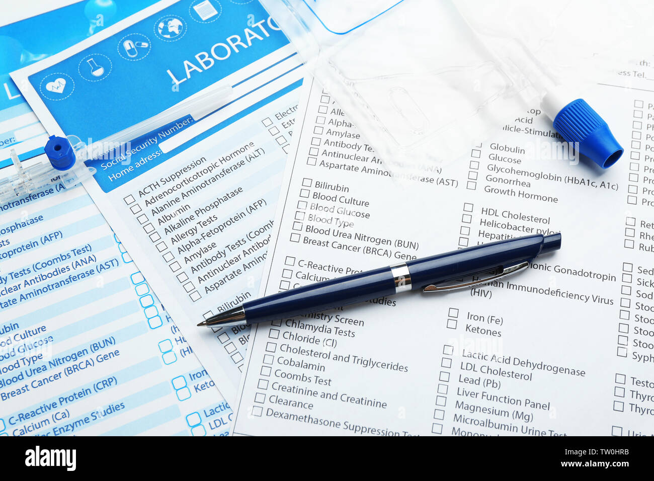 Items for laboratory analysis on test forms Stock Photo - Alamy