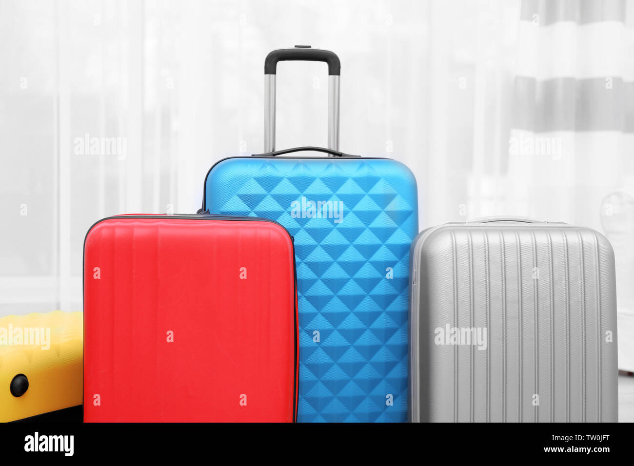 Packed travel suitcases at home Stock Photo Alamy