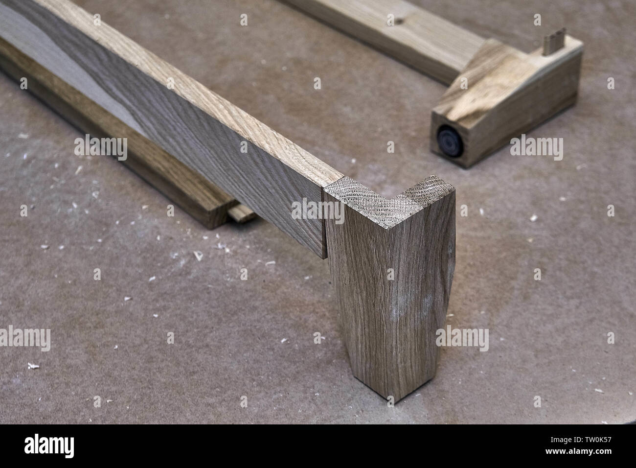 Furniture legs from solid oak. Closeup. Wooden furniture manufacturing