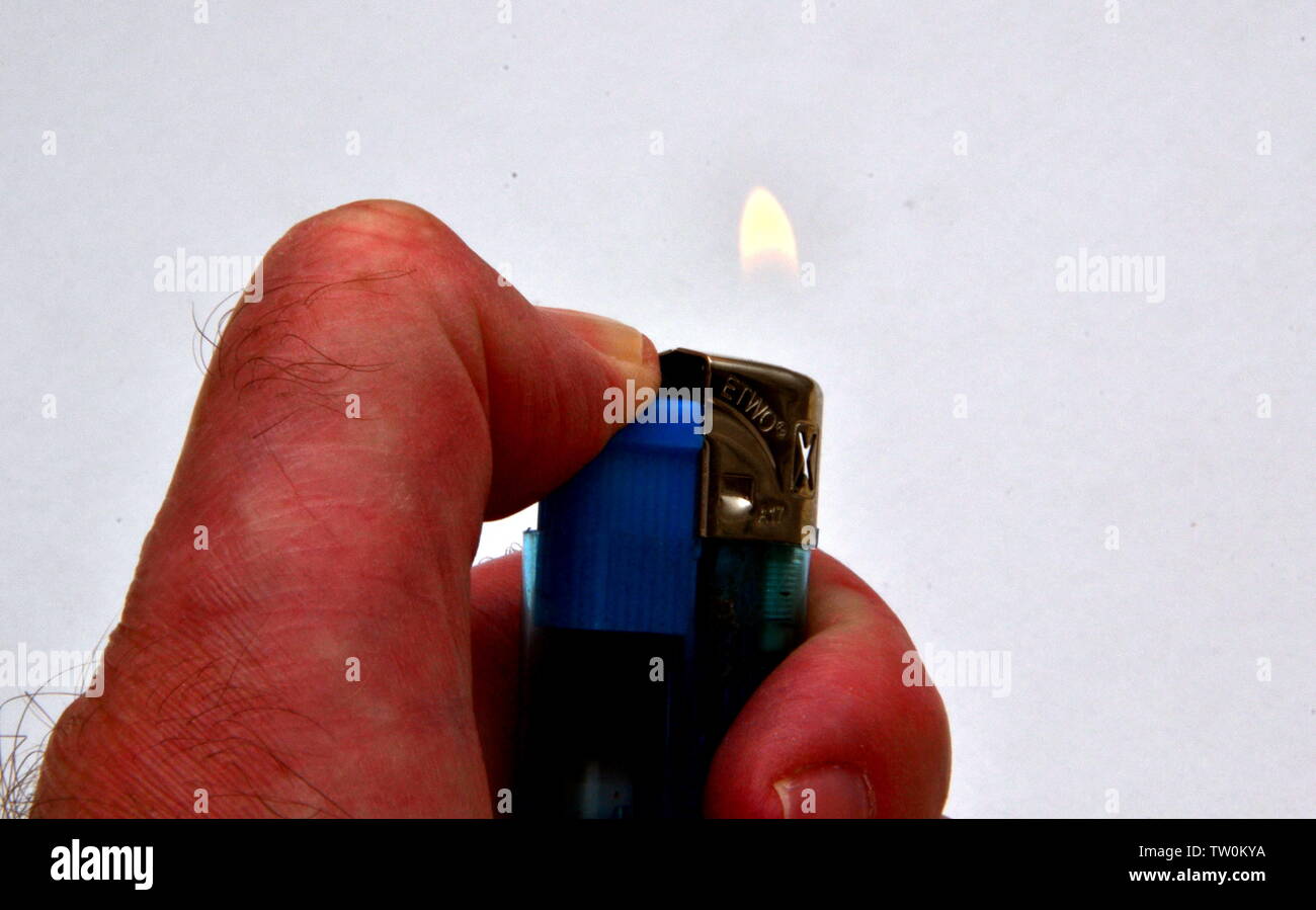 Thumb on lighter hires stock photography and images Alamy