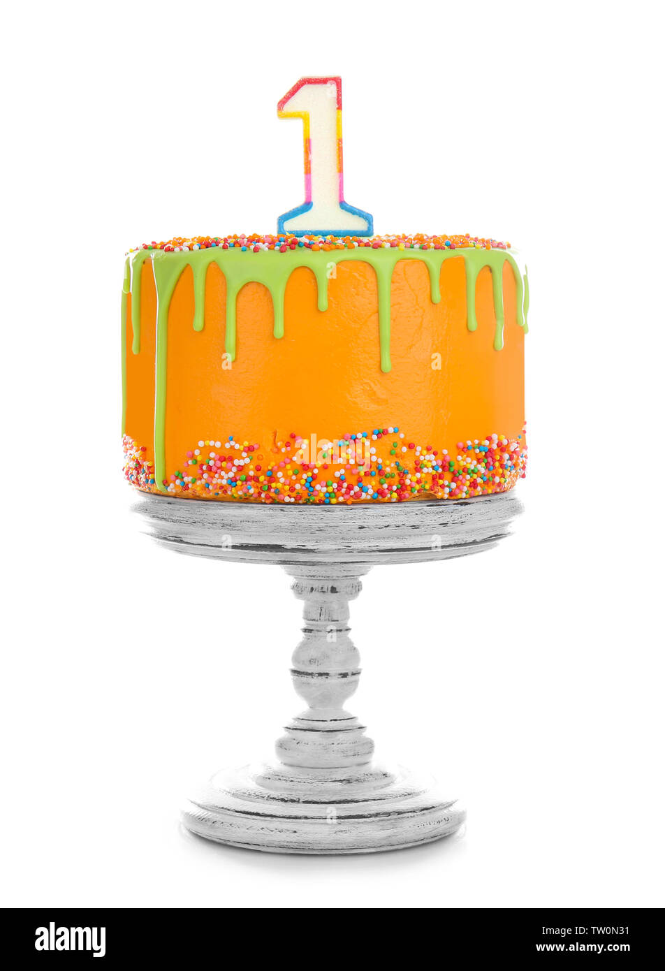 Birthday cake with one candle isolated on white Stock Photo Alamy