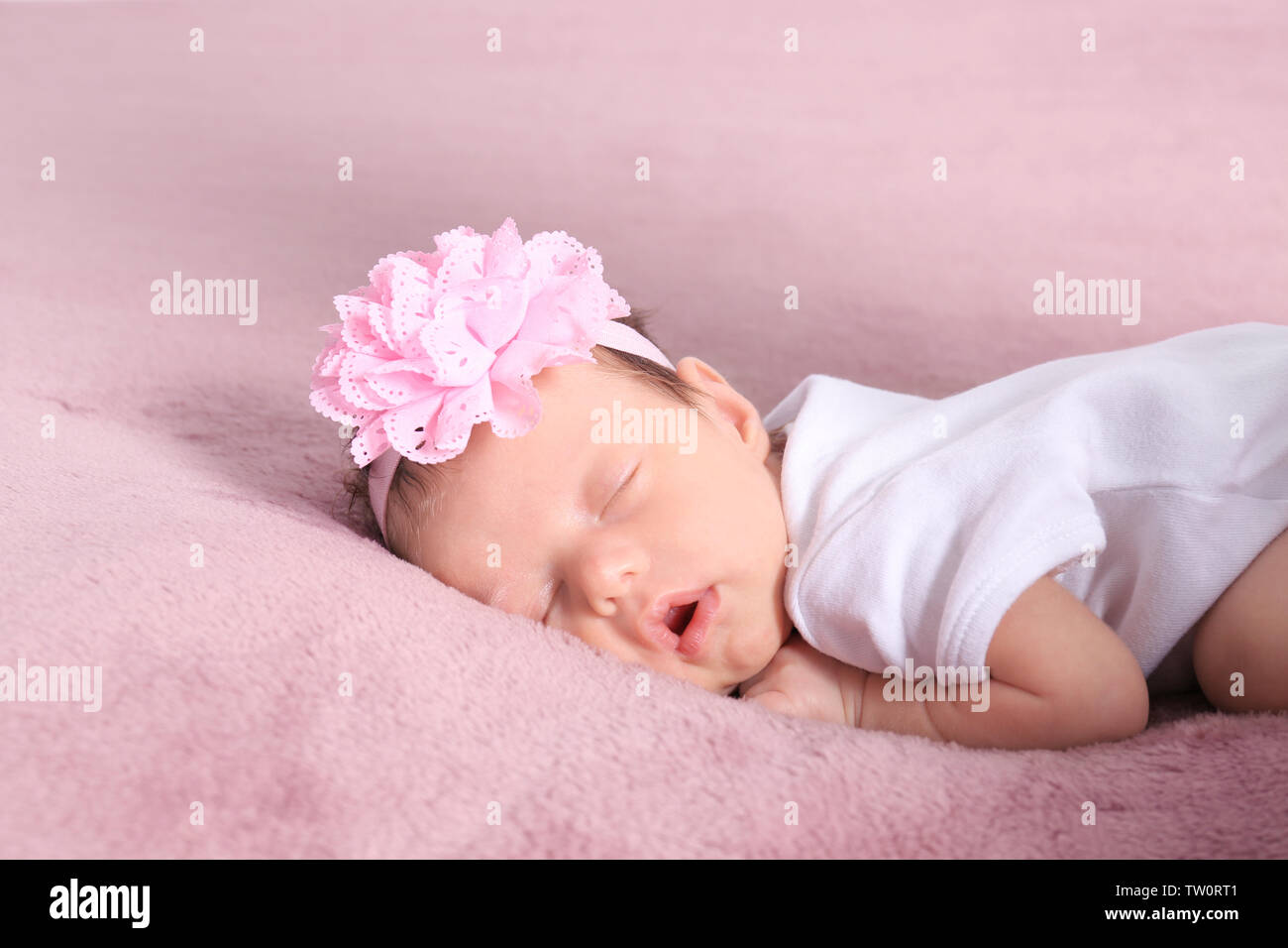 Cute little baby sleeping on bed at home Stock Photo Alamy