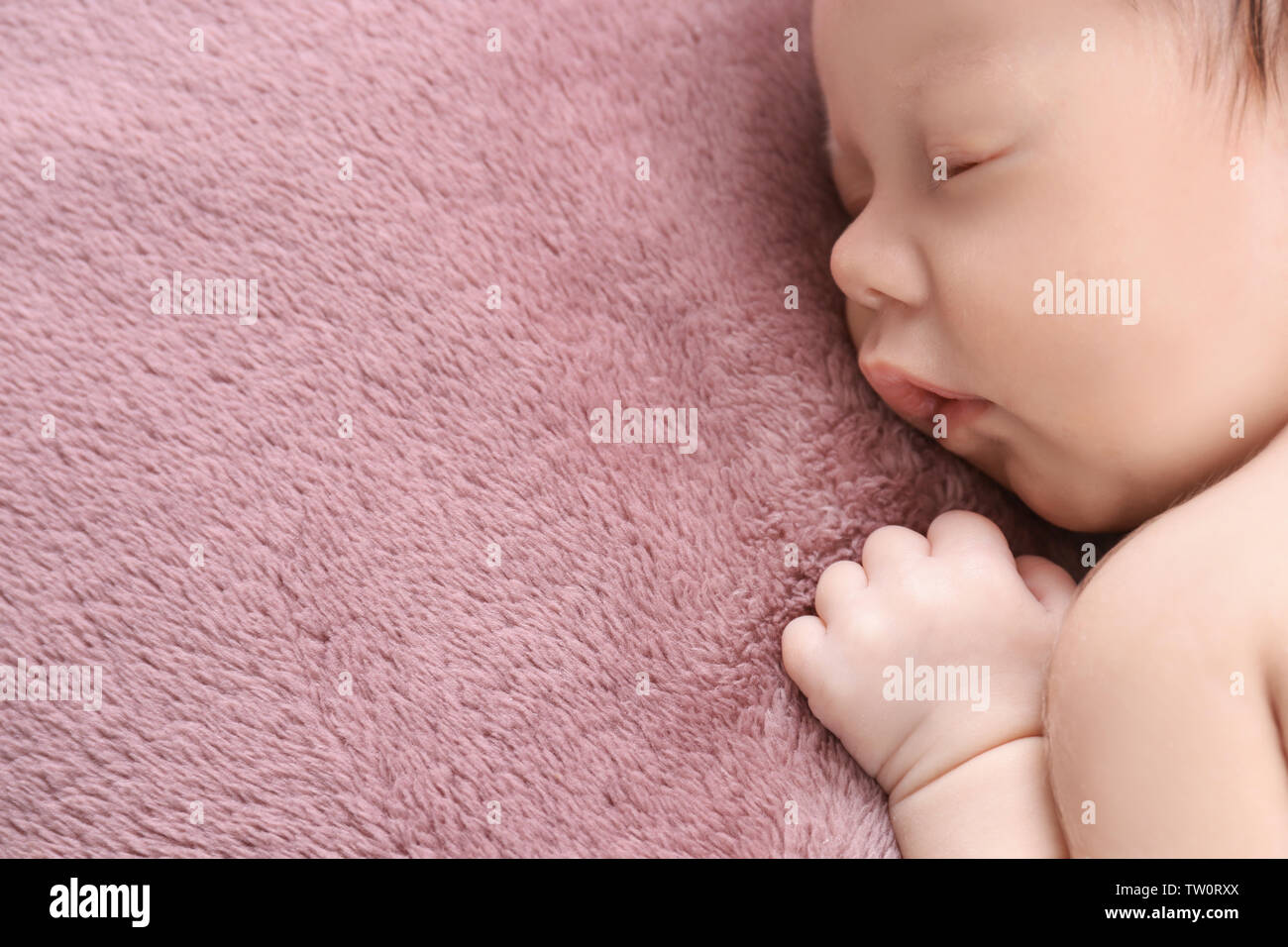 Cute little baby sleeping on bed at home Stock Photo Alamy