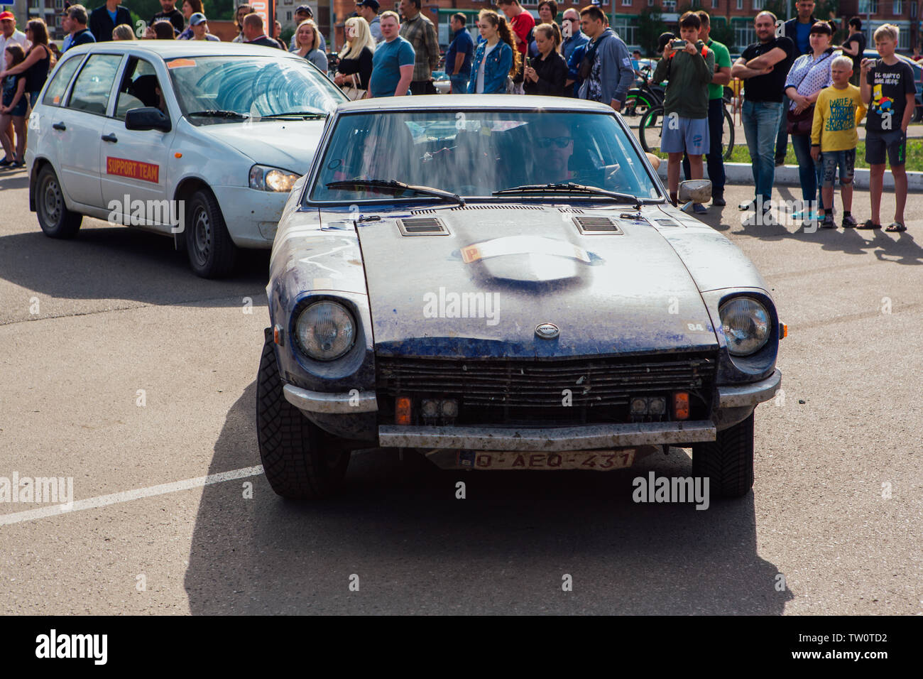 Novokuznetsk, Russia-June 14, 2019: The 7th Peking to Paris Motor Challenge 2019. Datsun 240Z 1971leaving the city and going to another stage of rally Stock Photo