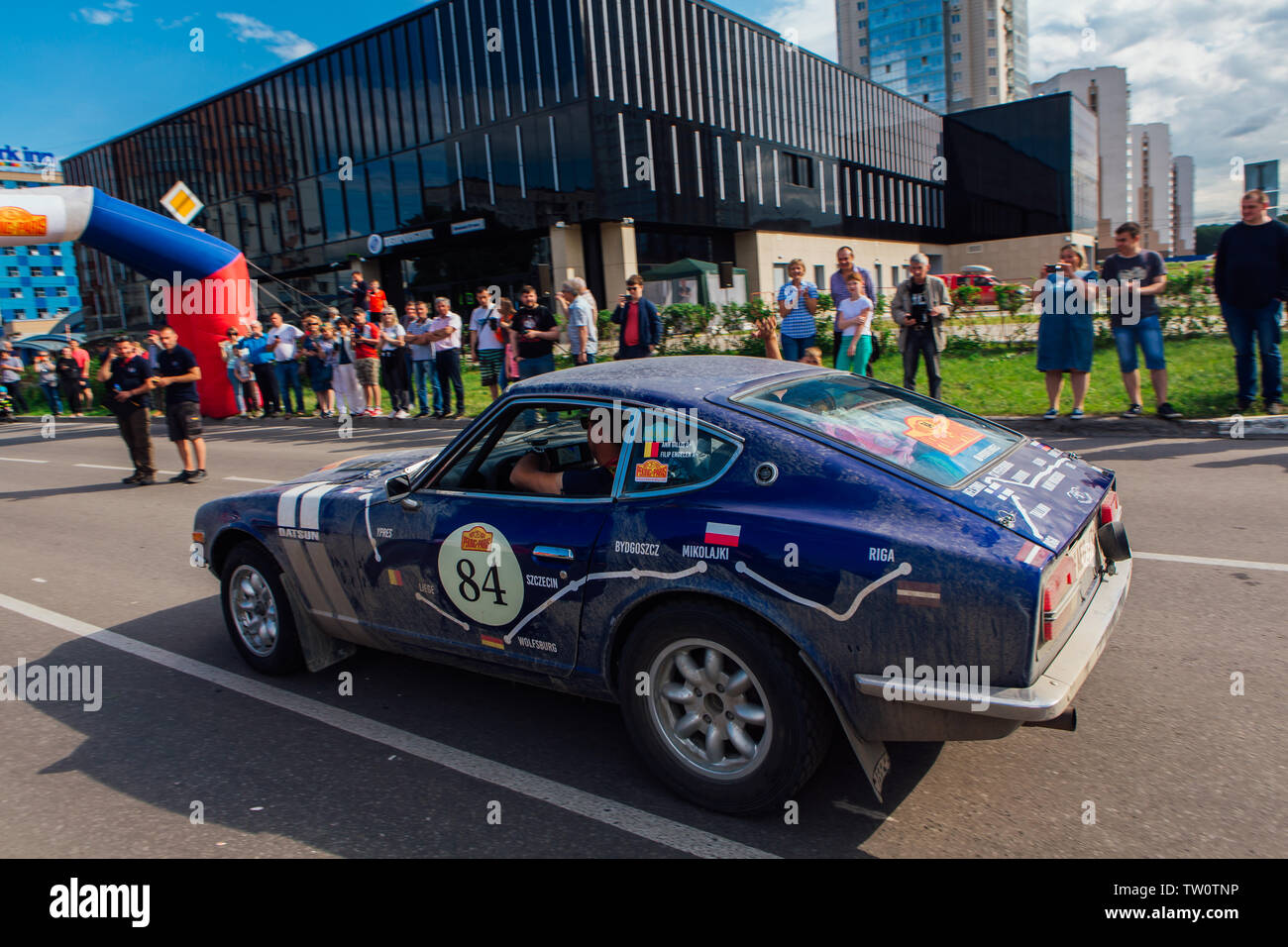 Novokuznetsk, Russia-June 14, 2019: The 7th Peking to Paris Motor Challenge 2019. Datsun 240Z 1971leaving the city and going to another stage of rally Stock Photo