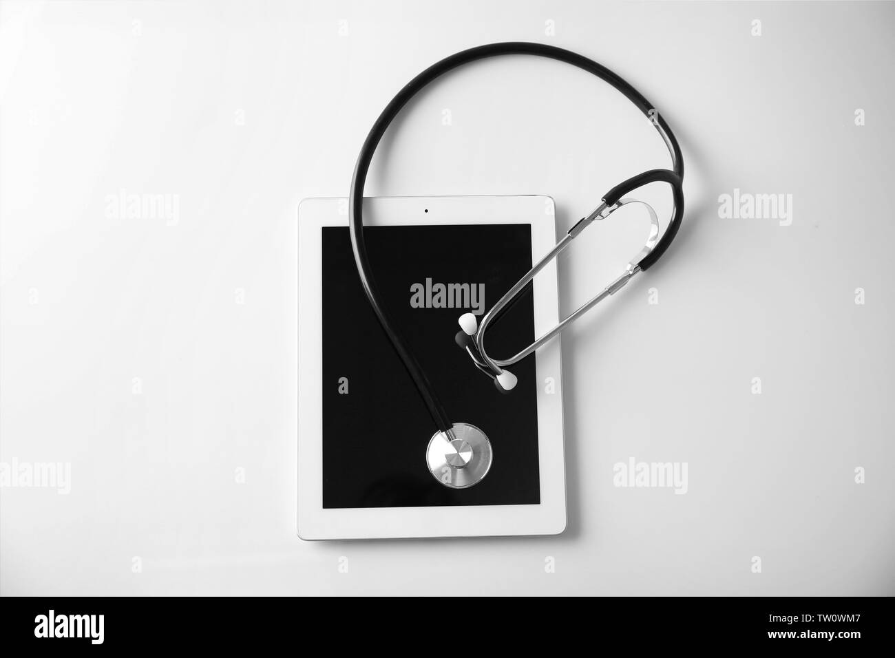 Stethoscope and tablet pc on white background Stock Photo - Alamy