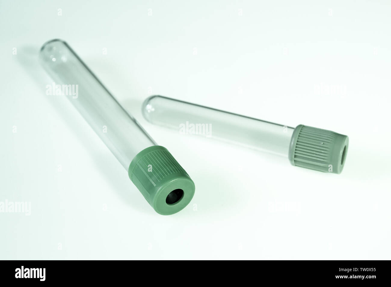 Two empty blood test tubes isolated on white background Stock Photo - Alamy
