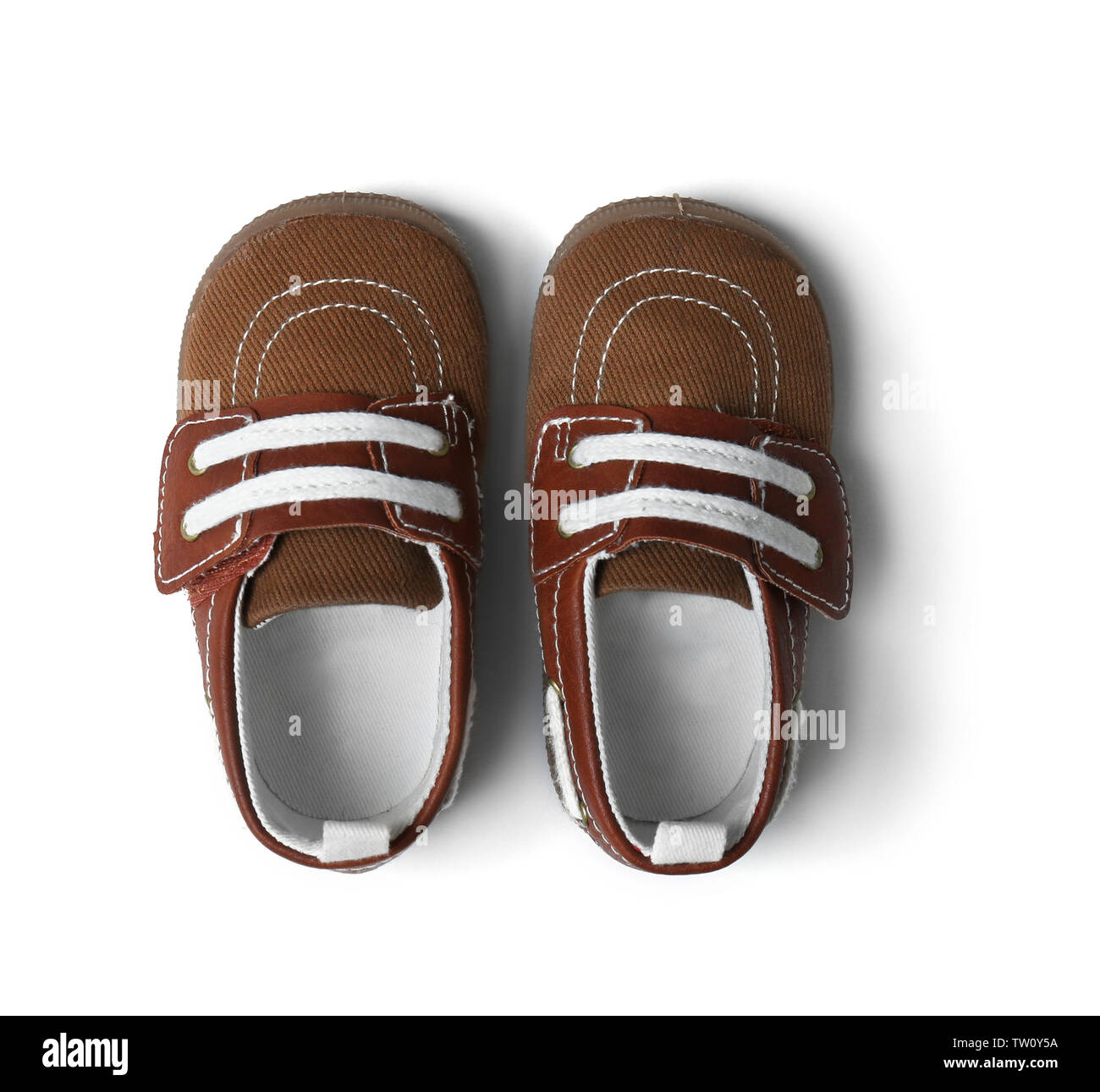 Cute baby shoes on white background Stock Photo - Alamy