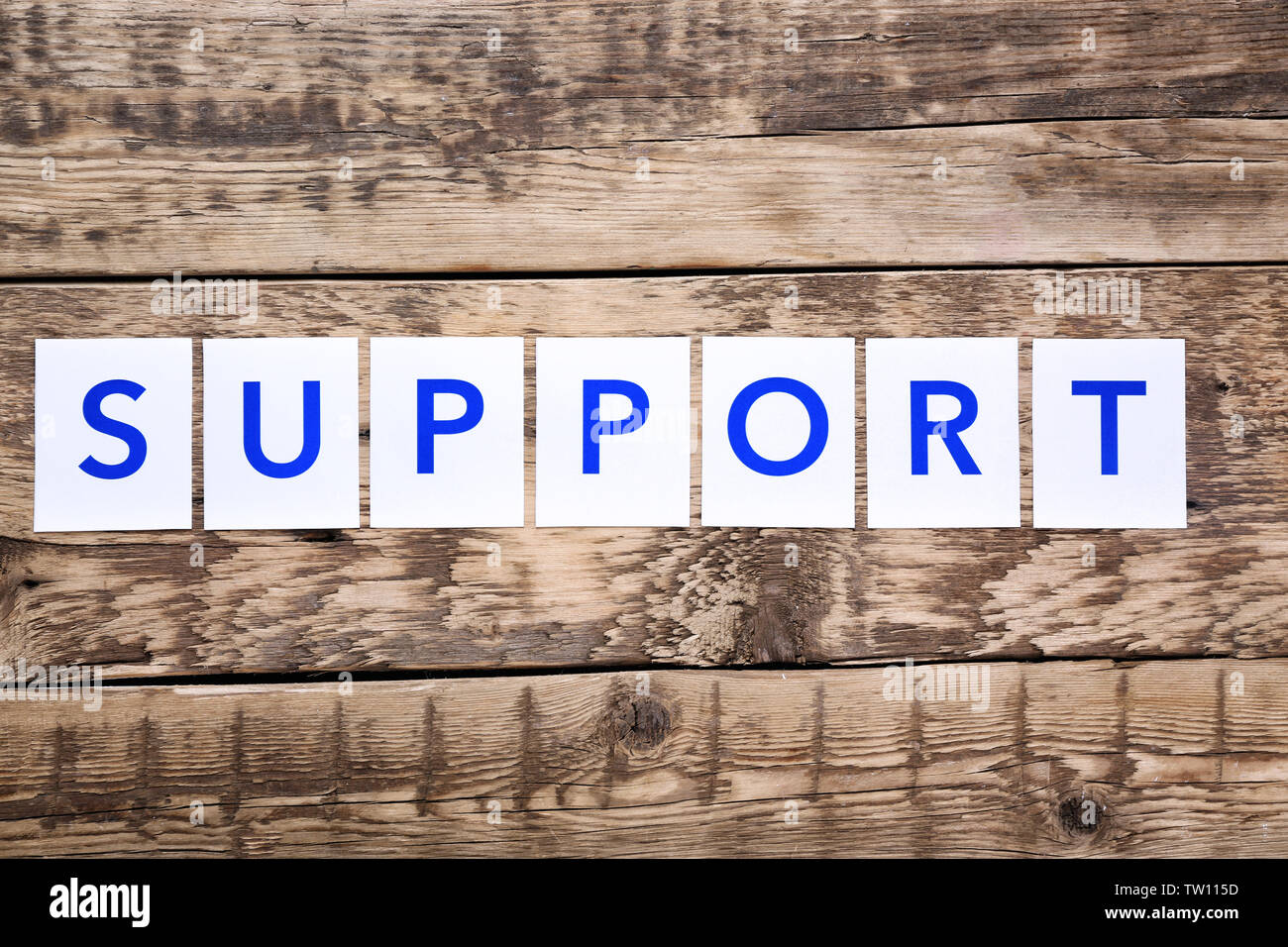 Word SUPPORT on wooden background Stock Photo - Alamy