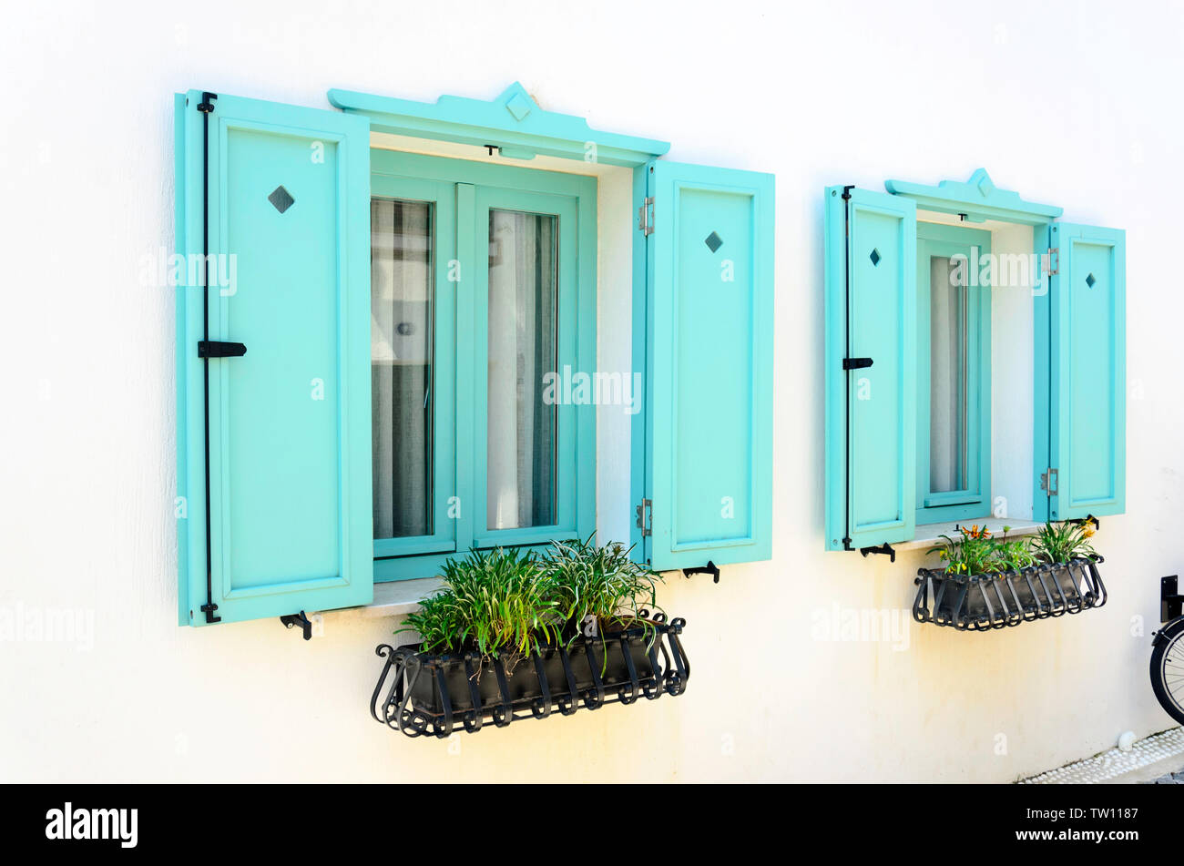 Beautiful vintage window with open green shutters Stock Photo - Alamy