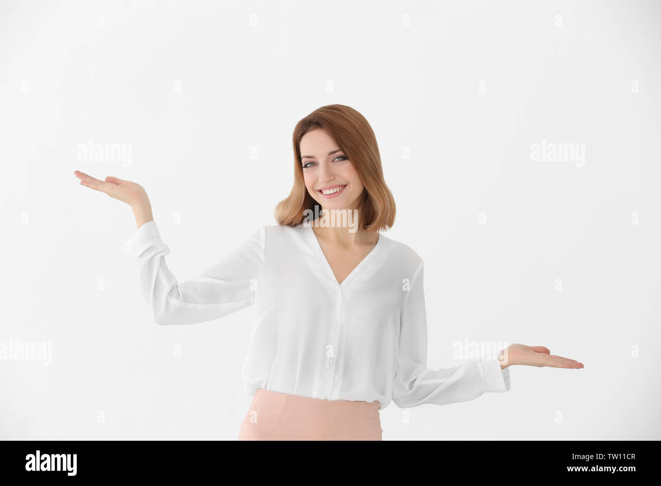 Young beautiful woman on white background Stock Photo - Alamy