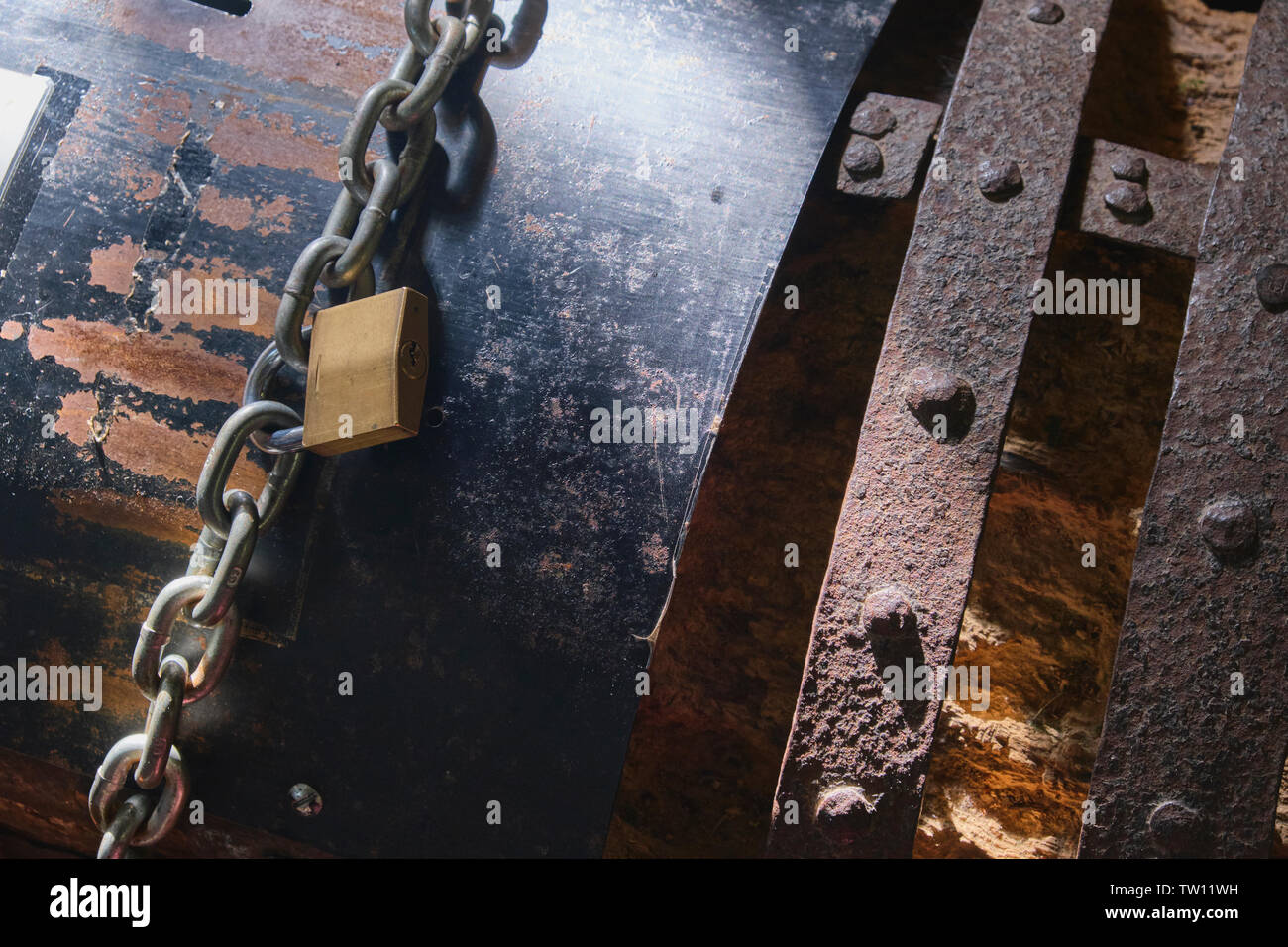 Secure padlocked chest closeup Stock Photo Alamy