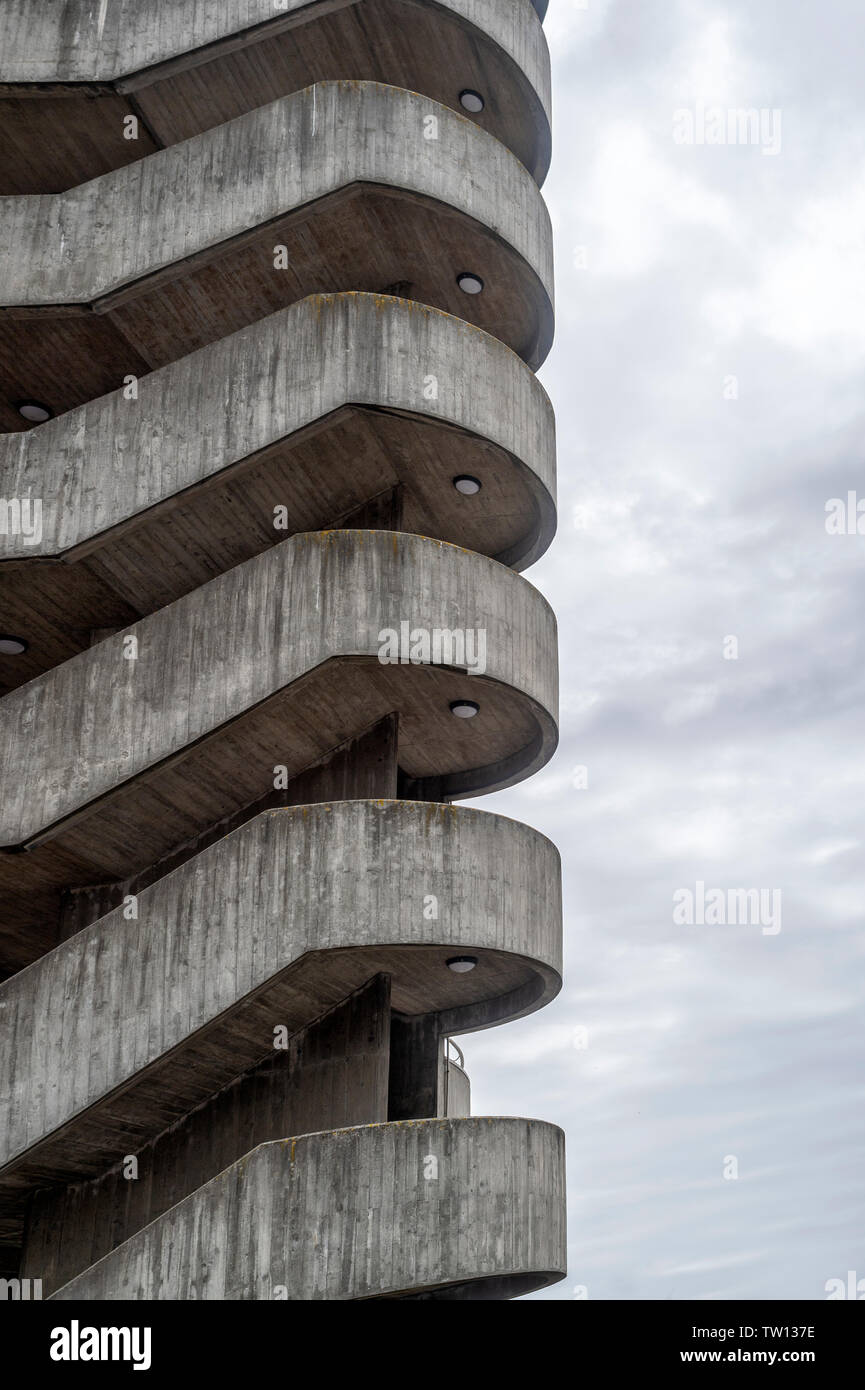 Brutalist concrete external stair towers on a hospital building in Porto, Portugal. Stock Photo