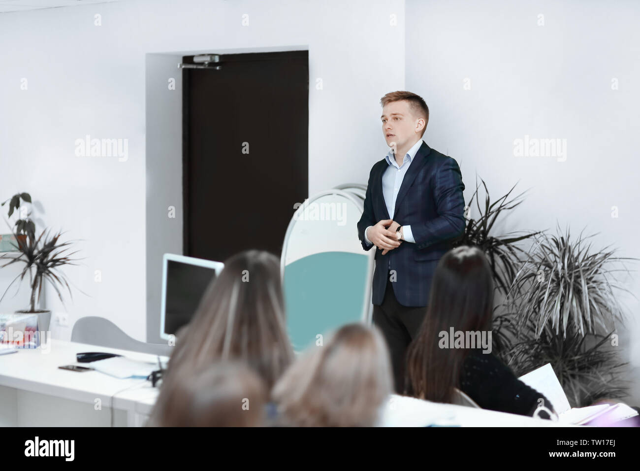 Business executive delivering a presentation to his colleagues.photo ...