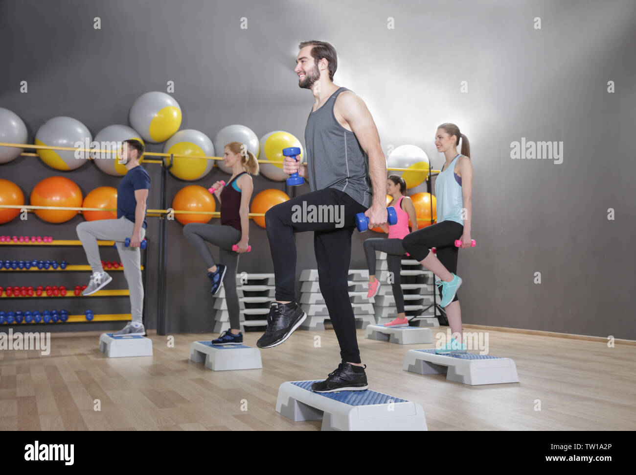 Group sporting young people hi-res stock photography and images - Alamy