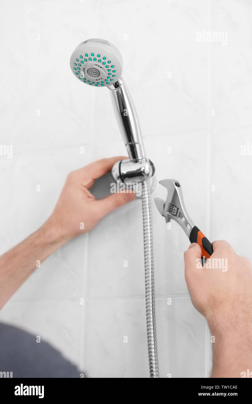 Adjustable shower head hires stock photography and images Alamy