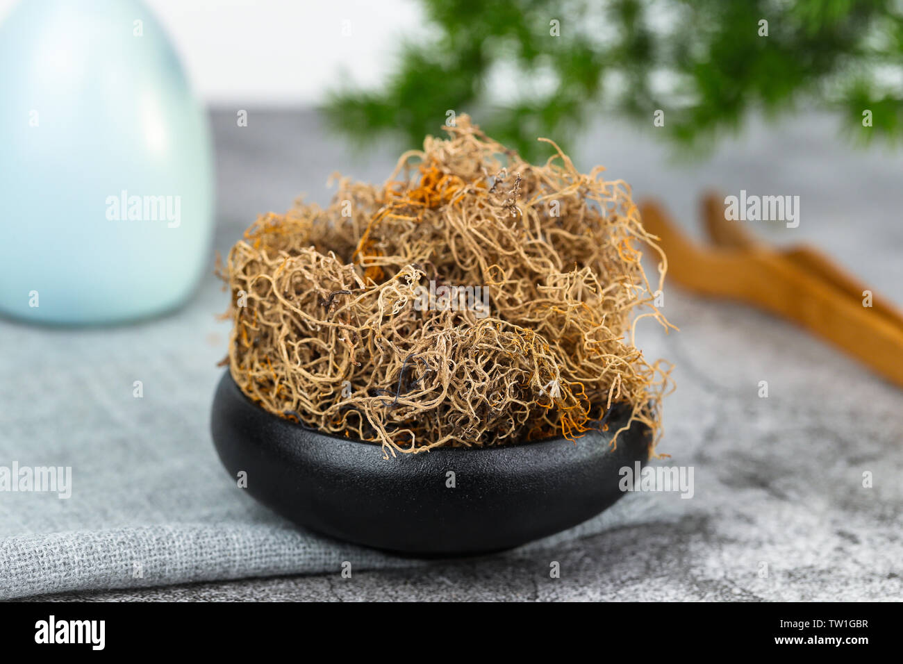 Black snow tea, gold silk tea Stock Photo Alamy