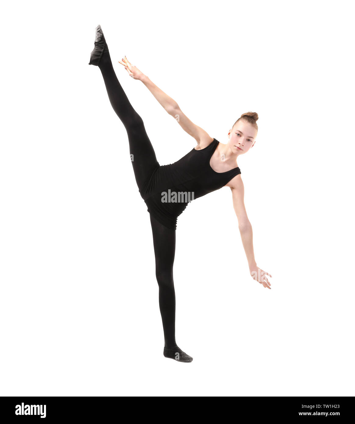 Young girl doing gymnastics on white background Stock Photo - Alamy