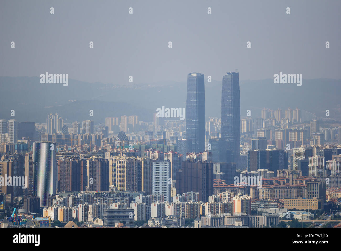 Polluted Chinese city with thick layer of smog Stock Photo