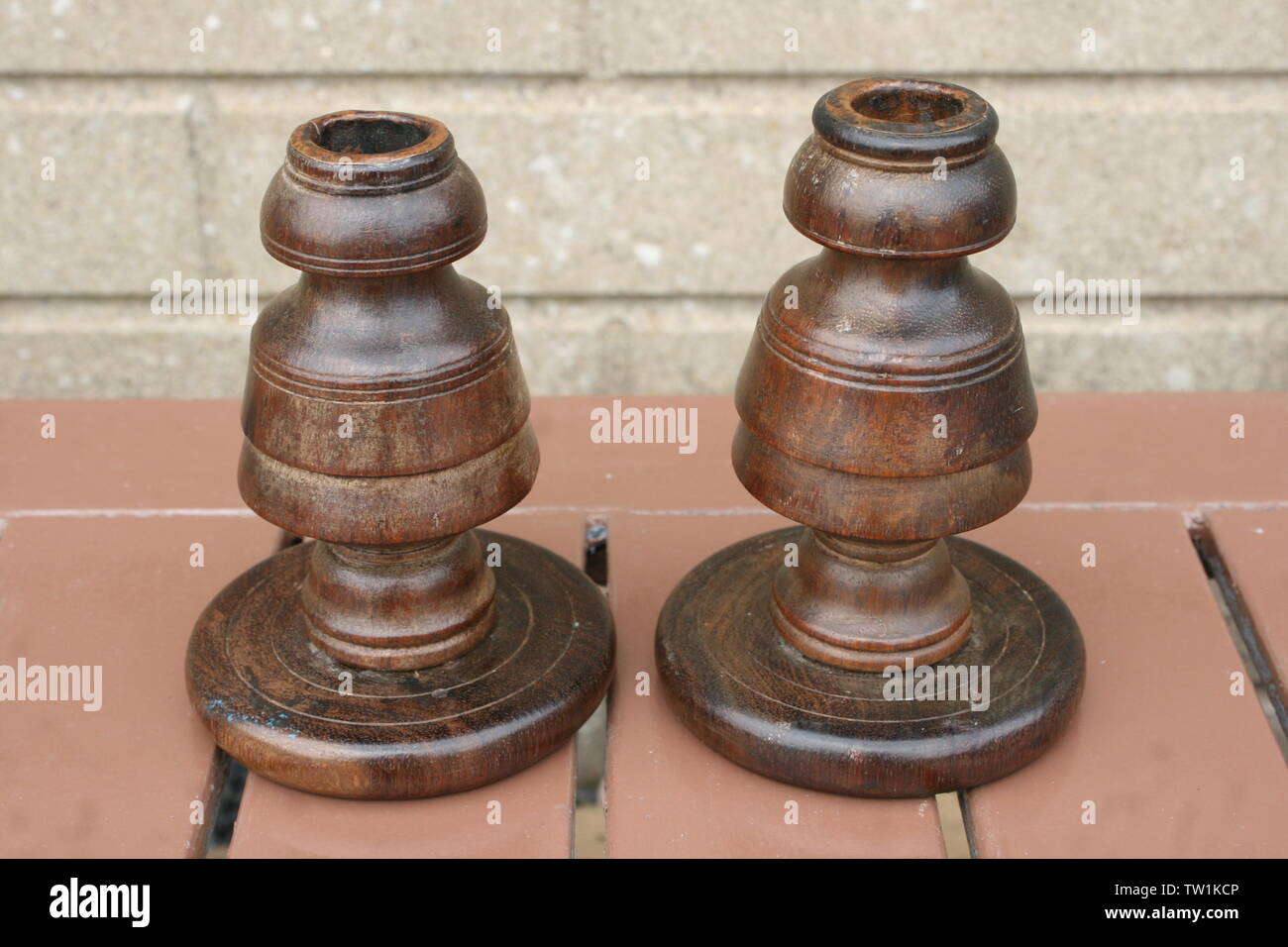 Antique turned hard wood candle sticks Stock Photo Alamy
