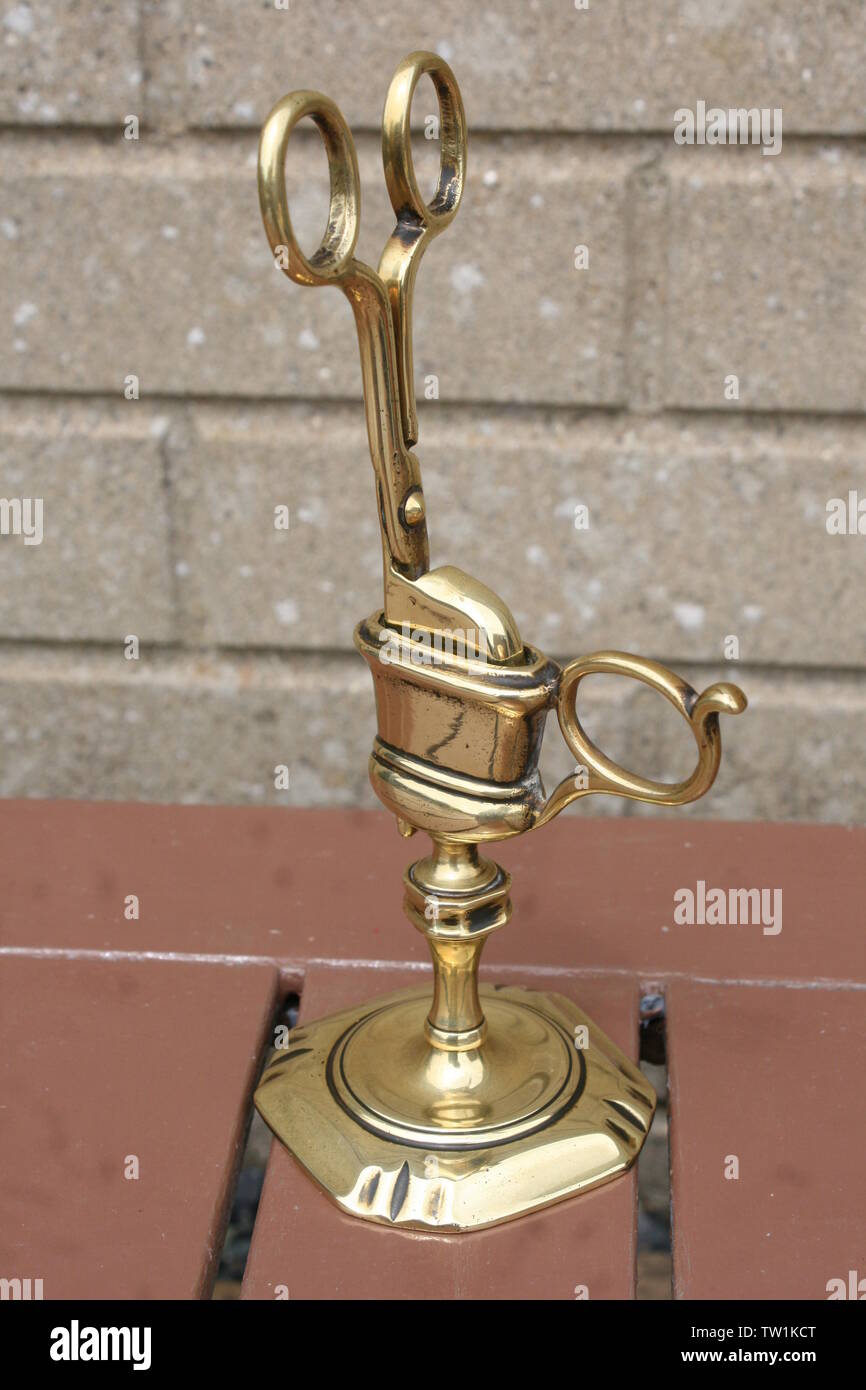 Antique Victorian brass candle snuffer and stand Stock Photo Alamy