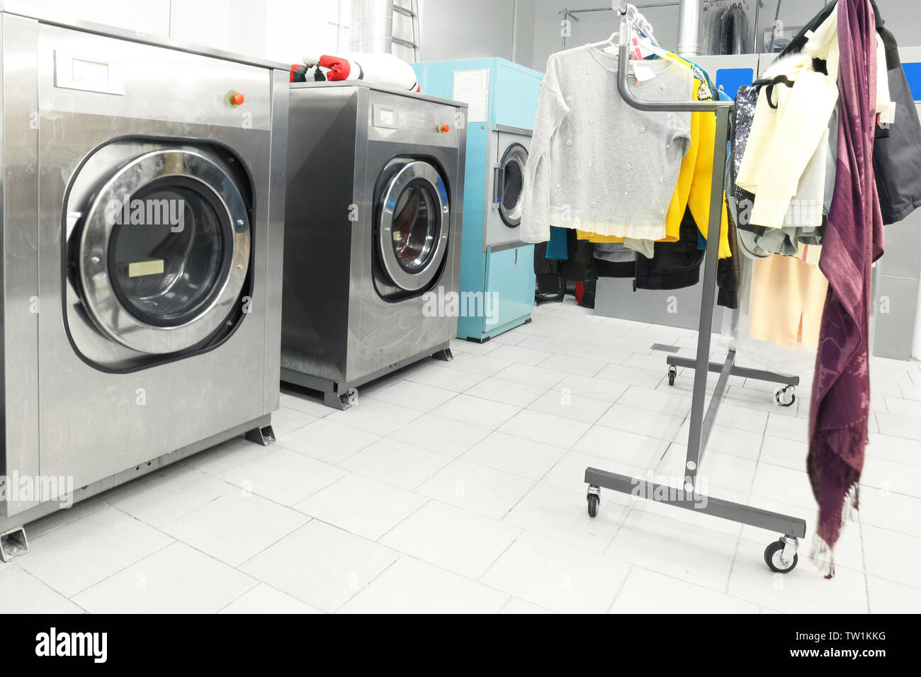 Washing machines at dry-cleaning Stock Photo - Alamy