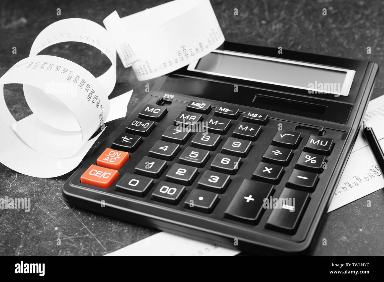 Calculator with adding machine tape closeup stock photo alamy