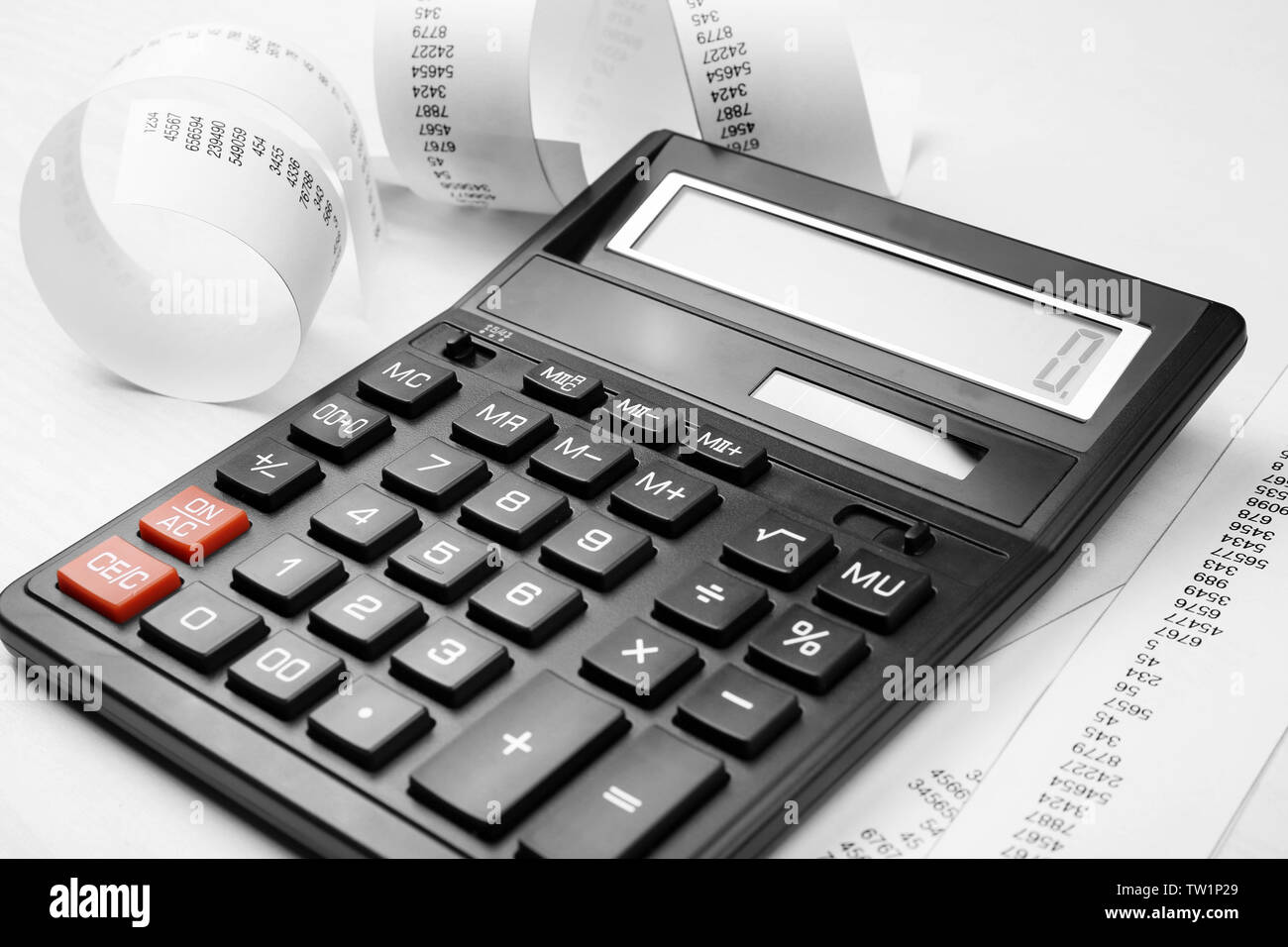 Calculator with adding machine tape, closeup Stock Photo Alamy