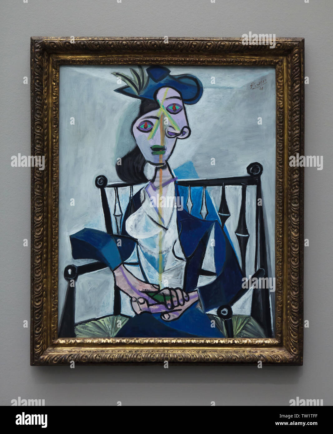 Painting 'Seated Woman' ('Dora Maar') by Pablo Picasso (1941) on display in the Pinakothek der Moderne in Munich, Bavaria, Germany. Stock Photo