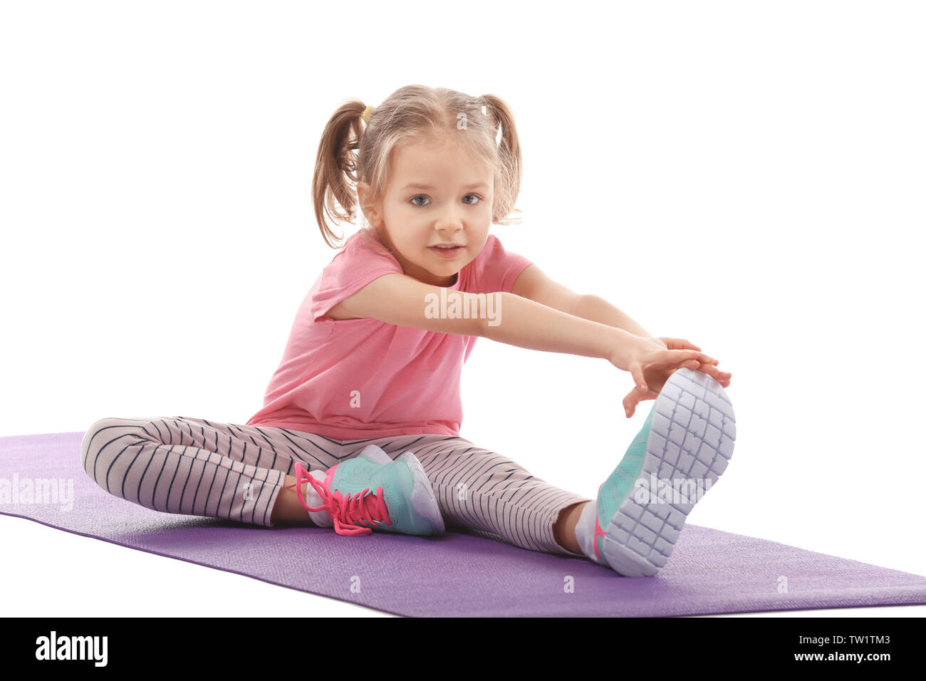 Little girl practicing yoga isolated hi-res stock photography and images -  Alamy