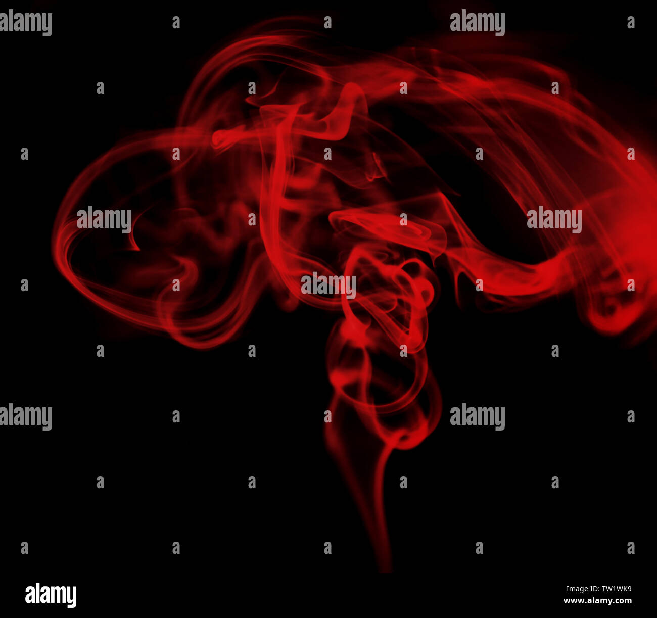 Swirl of red smoke on dark background Stock Photo - Alamy