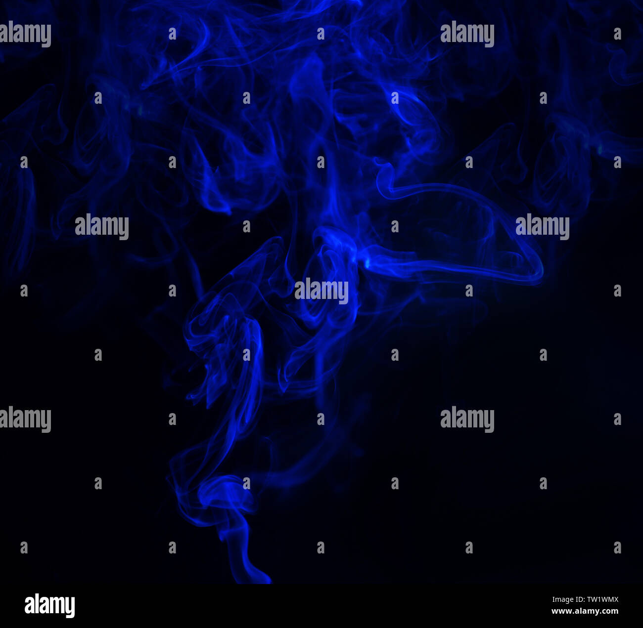 Swirl of blue smoke on black background Stock Photo - Alamy