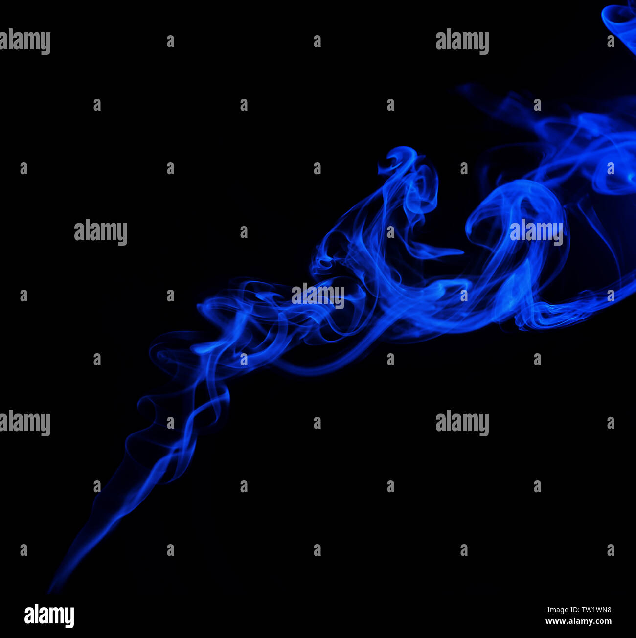 Swirl of blue smoke on black background Stock Photo - Alamy