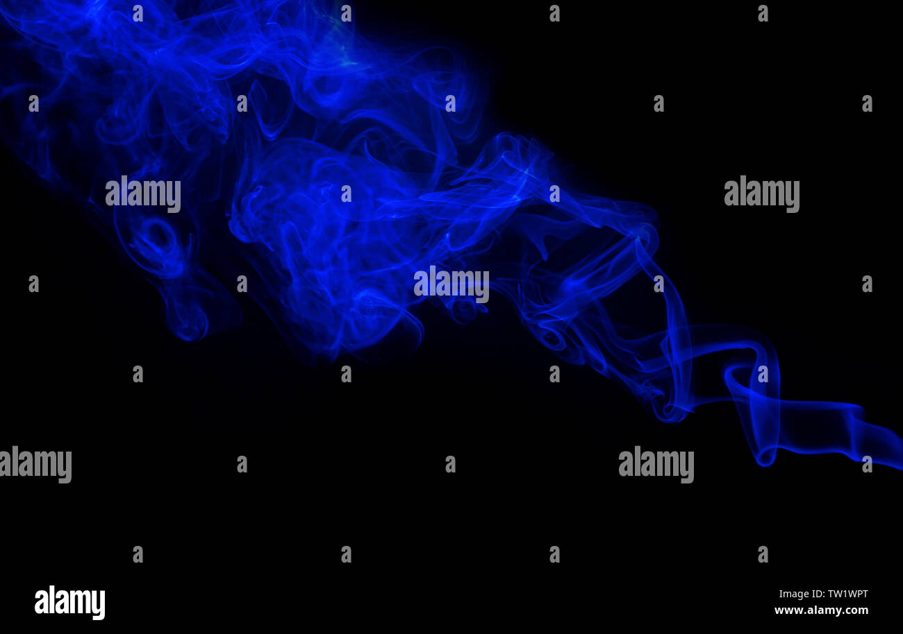 Swirl of blue smoke on black background Stock Photo - Alamy