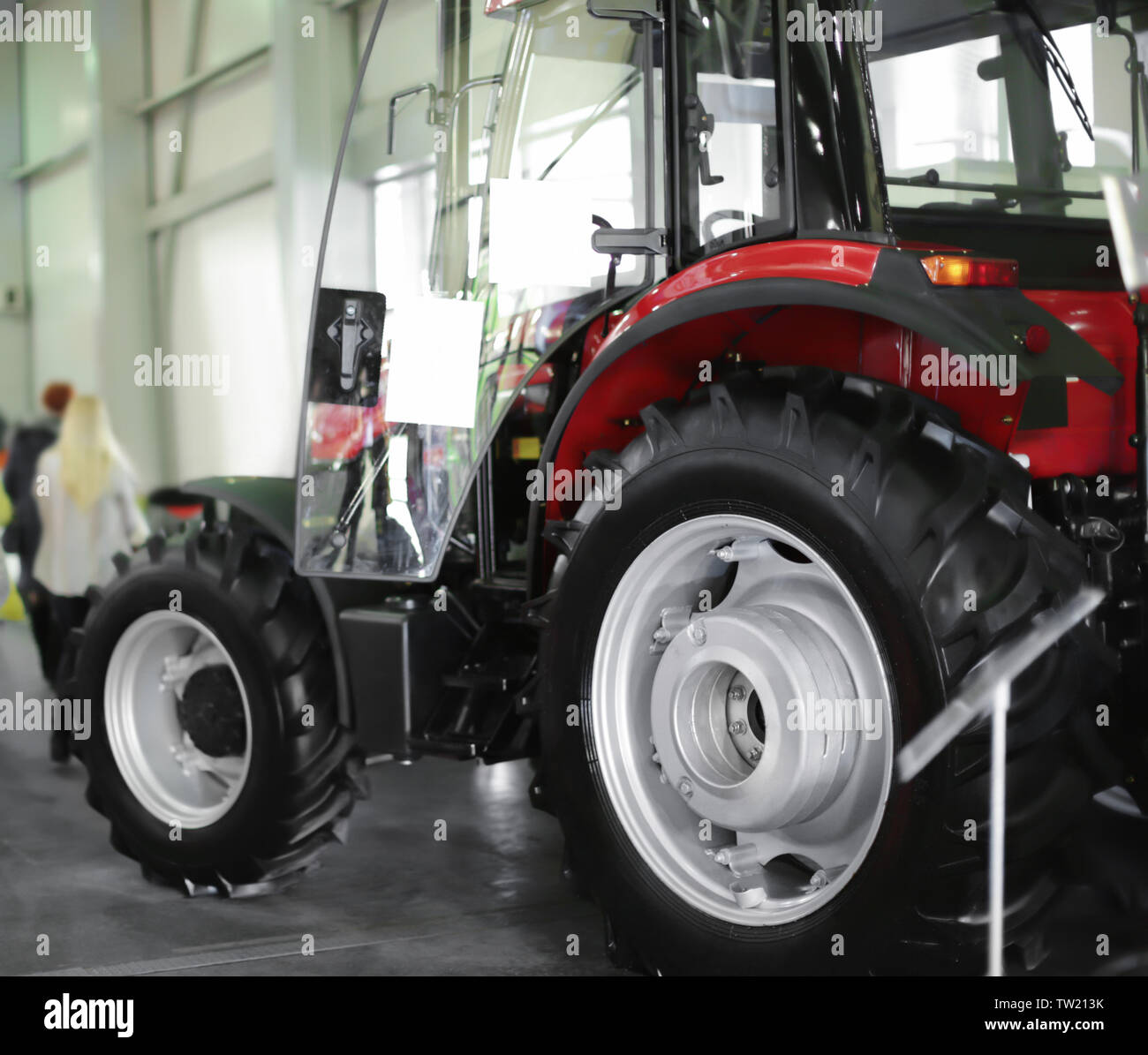 Modern tractor on agricultural exhibition Stock Photo