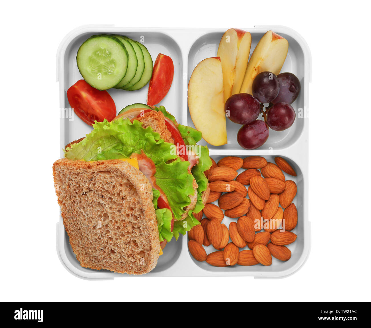 Lunch box with delicious food on white background Stock Photo - Alamy