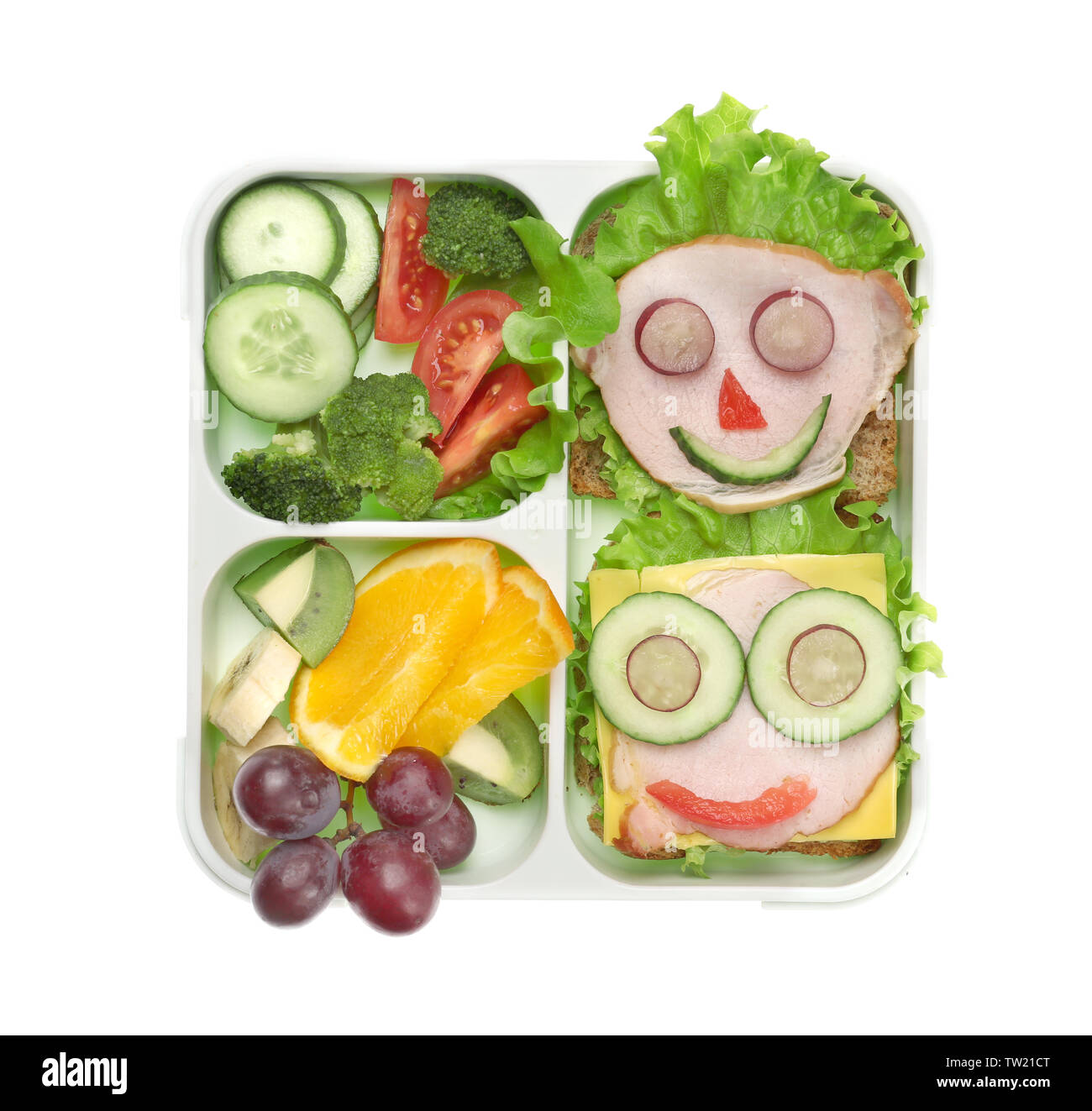 Lunch box with delicious food on white background Stock Photo - Alamy