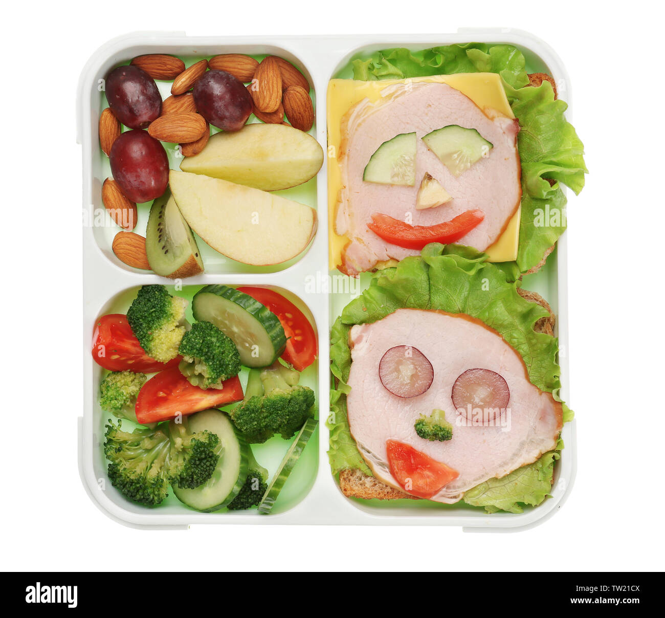 Lunch box with delicious food on white background Stock Photo - Alamy