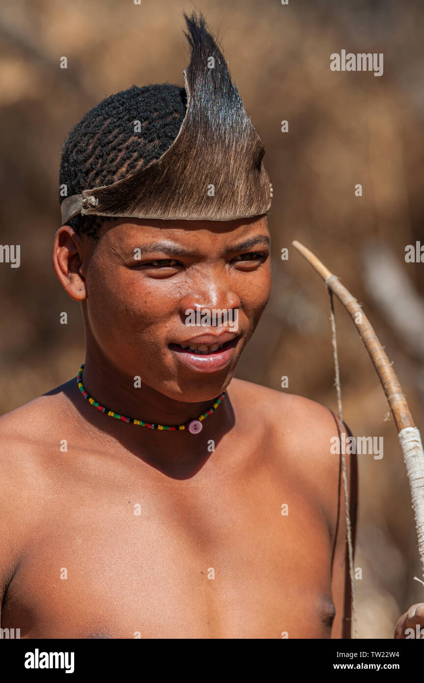 Young male Bushman hunter Stock Photo
