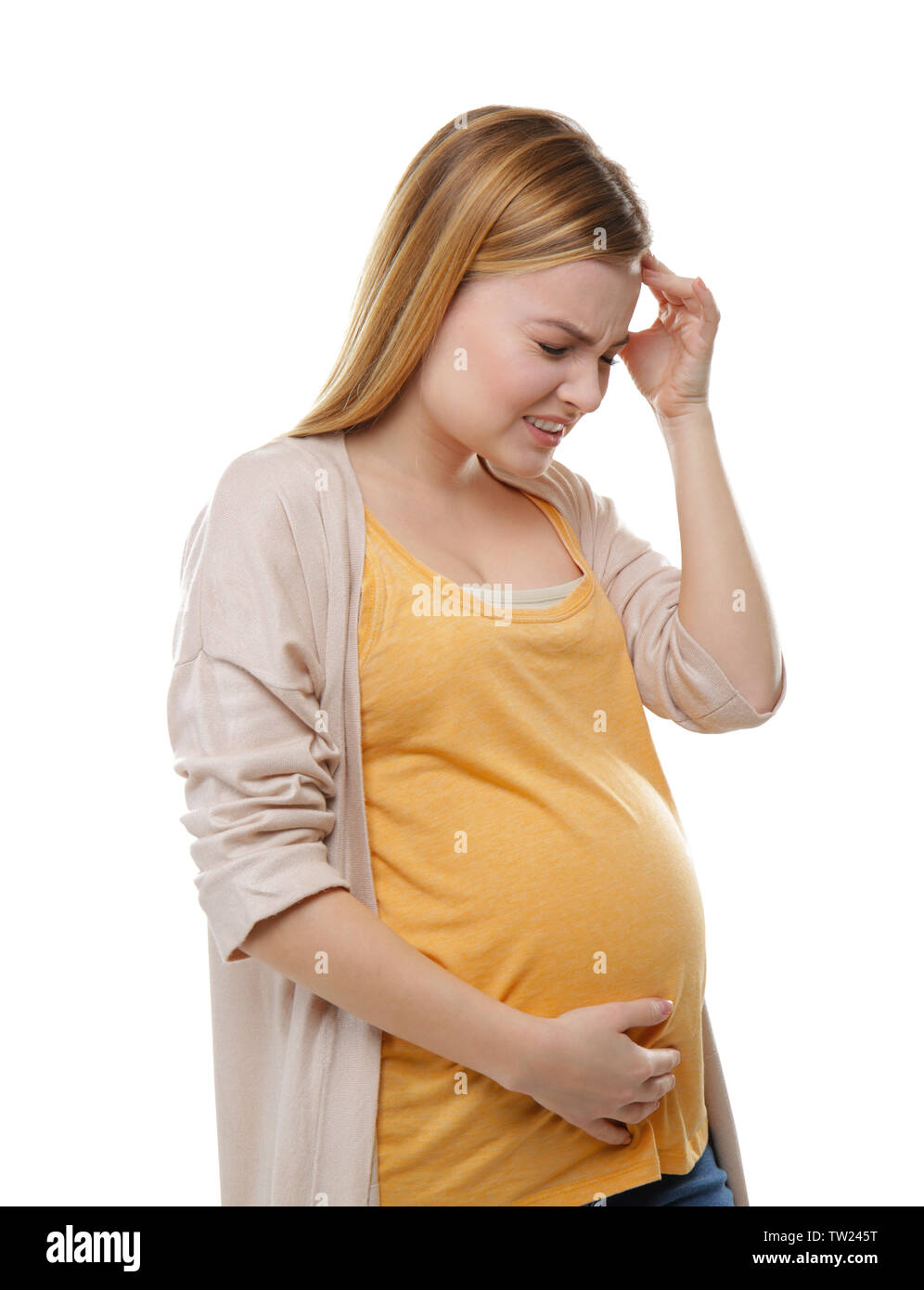 Pregnant woman suffering from headaches on white background Stock Photo
