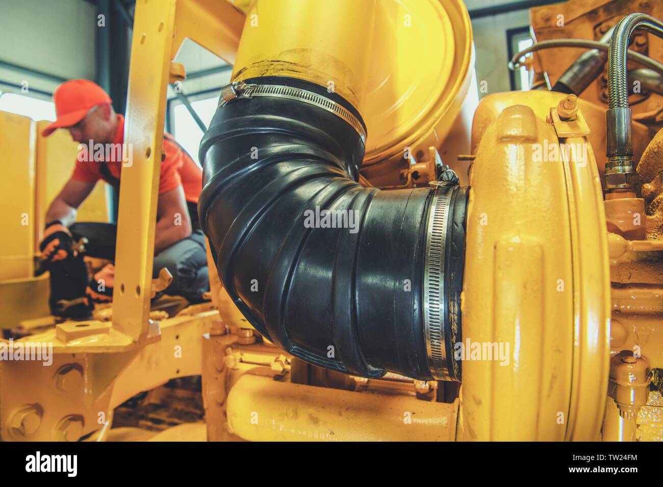 Heavy Duty Machinery Diesel Engine Repair by Professional Caucasian