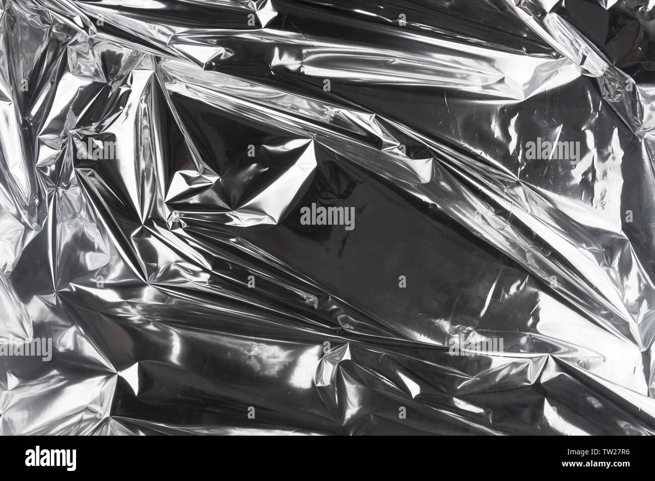 Silver foil background Black and White Stock Photos & Images - Alamy