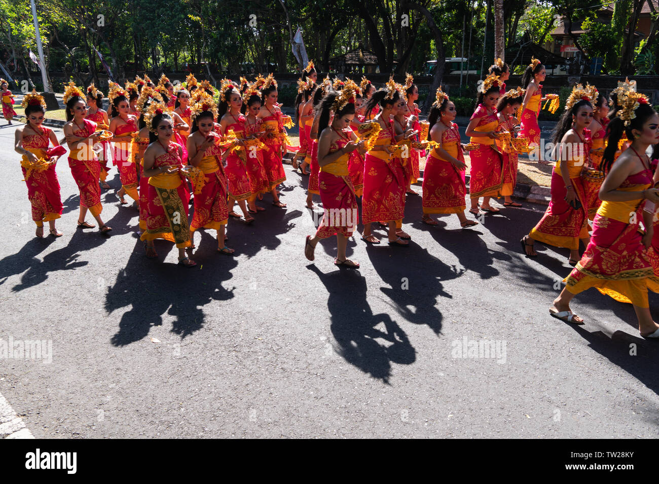 DENPASAR/BALI-JUNE 15 2019: Young Balinese women wearing traditional Balinese headdress and traditional sarong at the opening ceremony of the Bali Art Stock Photo