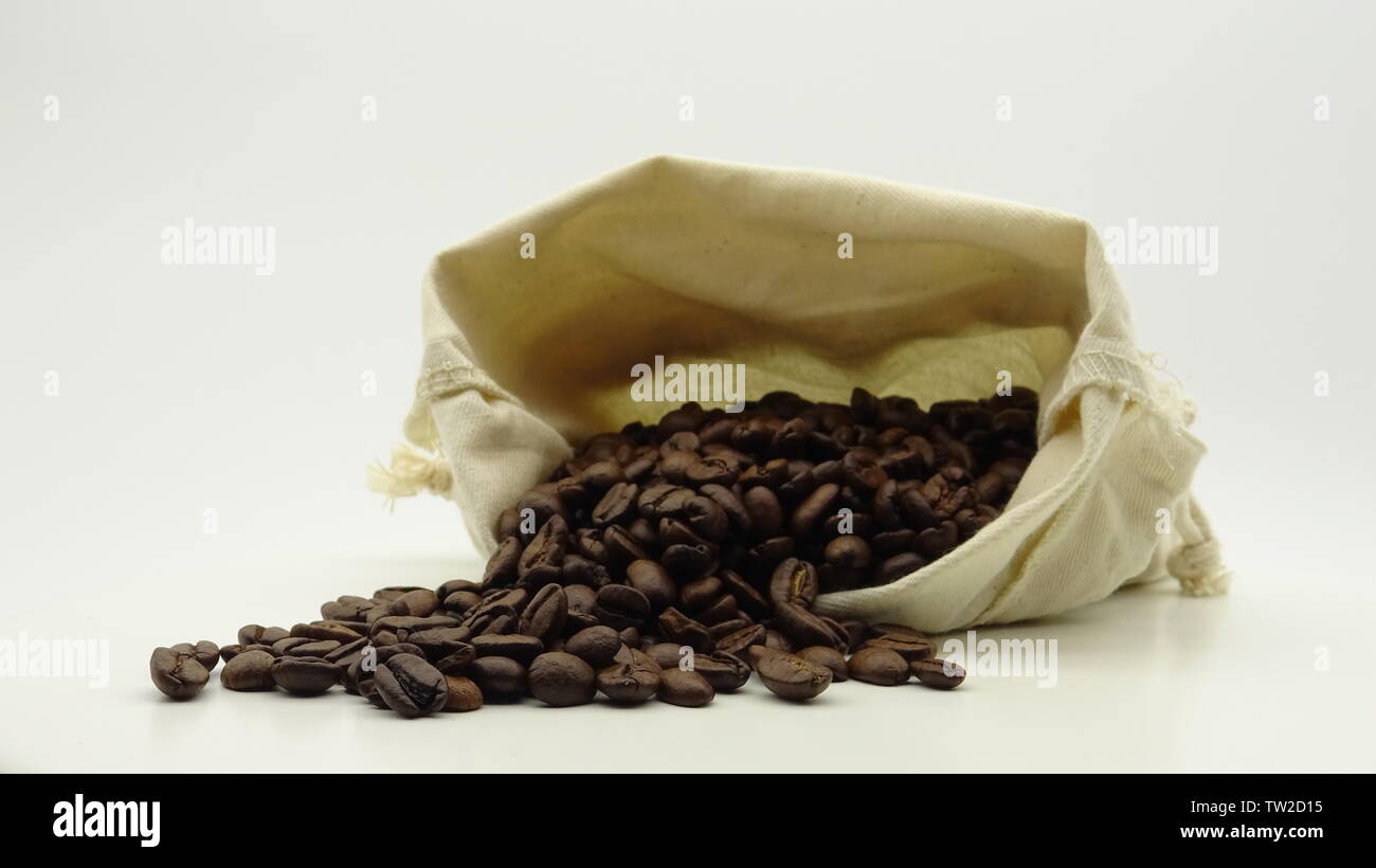 A sack with roasted coffee beans on white background Stock Photo - Alamy