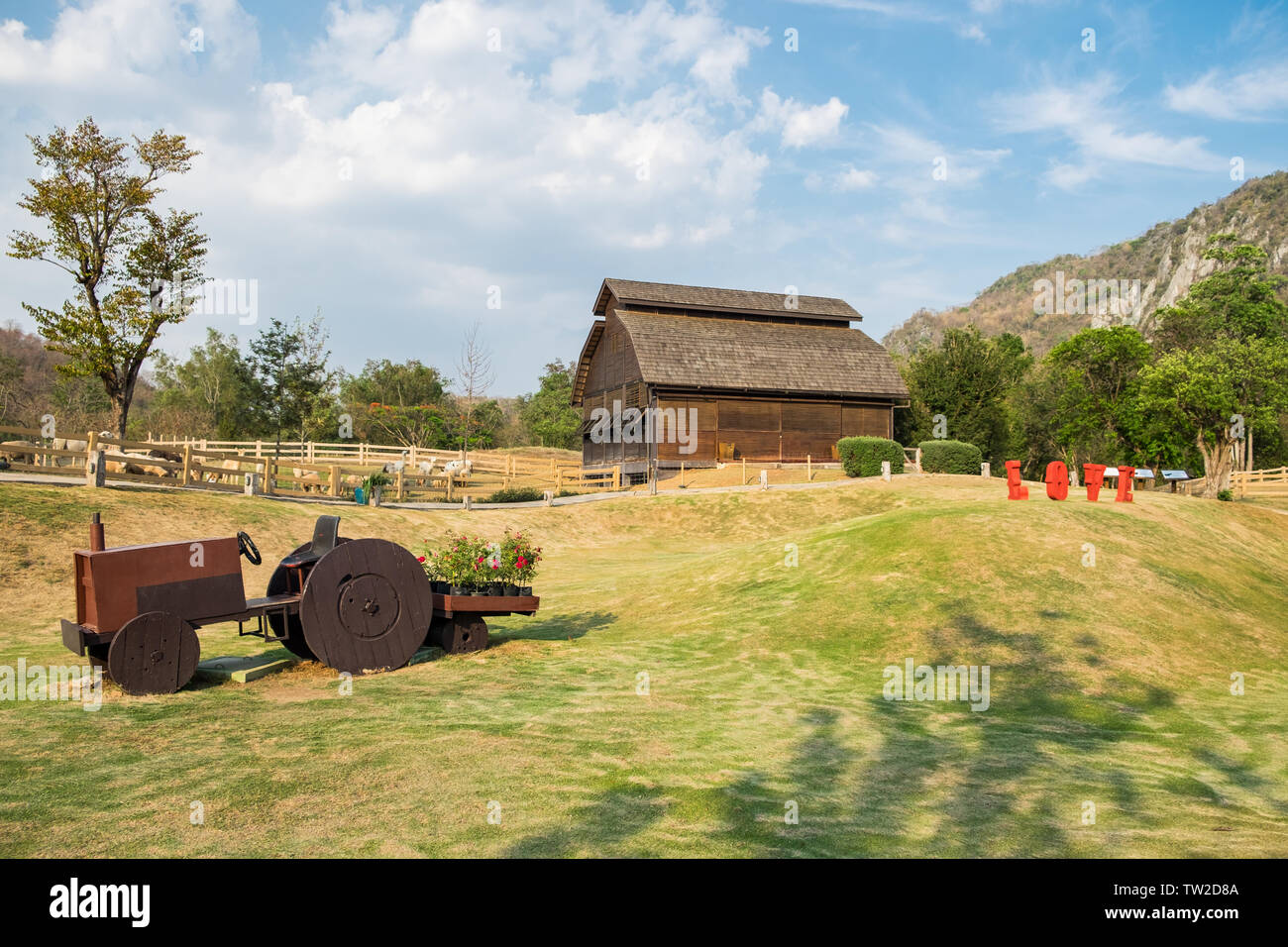 Livestock barn wooden with cart in slope farm,Primo Piazza,Khao Yai