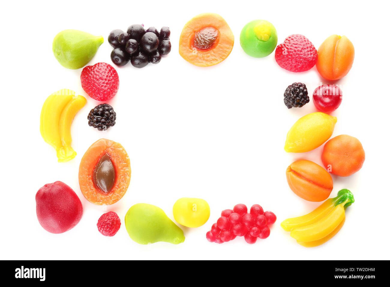 Frame made of fruit jelly candies on white background Stock Photo - Alamy