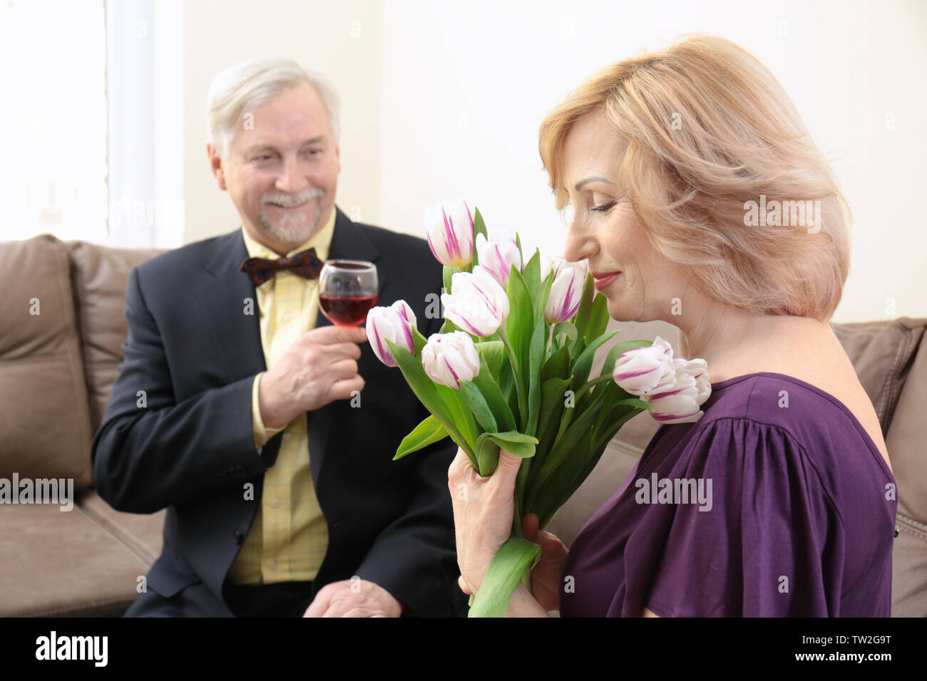 Elderly couple celebrating wedding anniversary at home Stock Photo Alamy