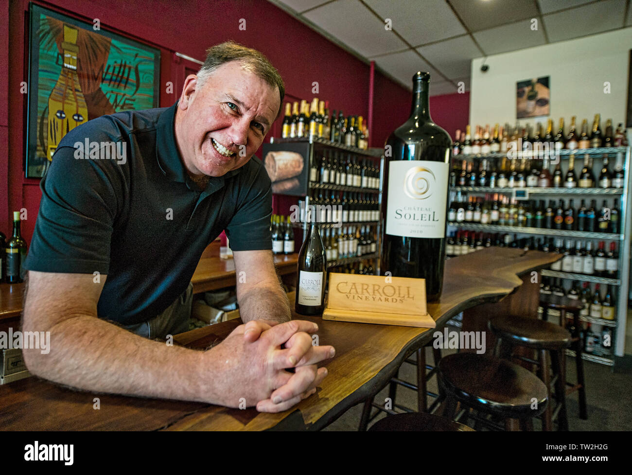UNITED STATES - November 16. 2015: Mike Carroll poses for a photo at his shop in downtown Leesburg Virginia. The photo was taken for a feature story o Stock Photo